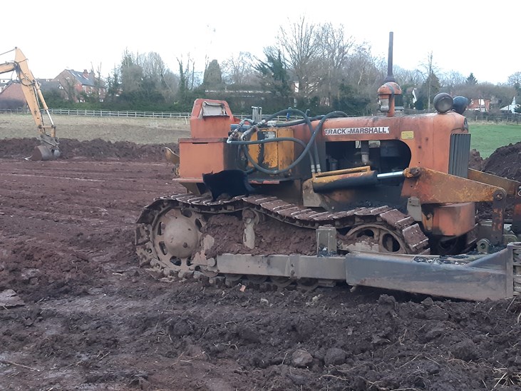 Machinery digging arena