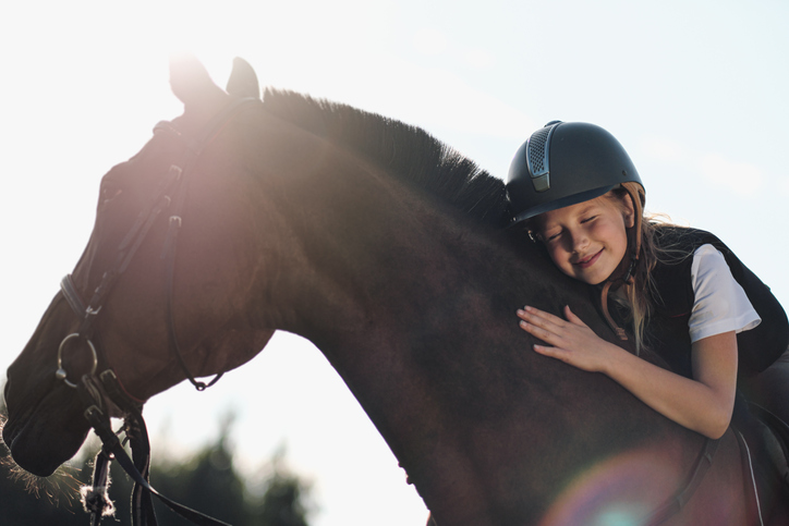 Happy owner and horse