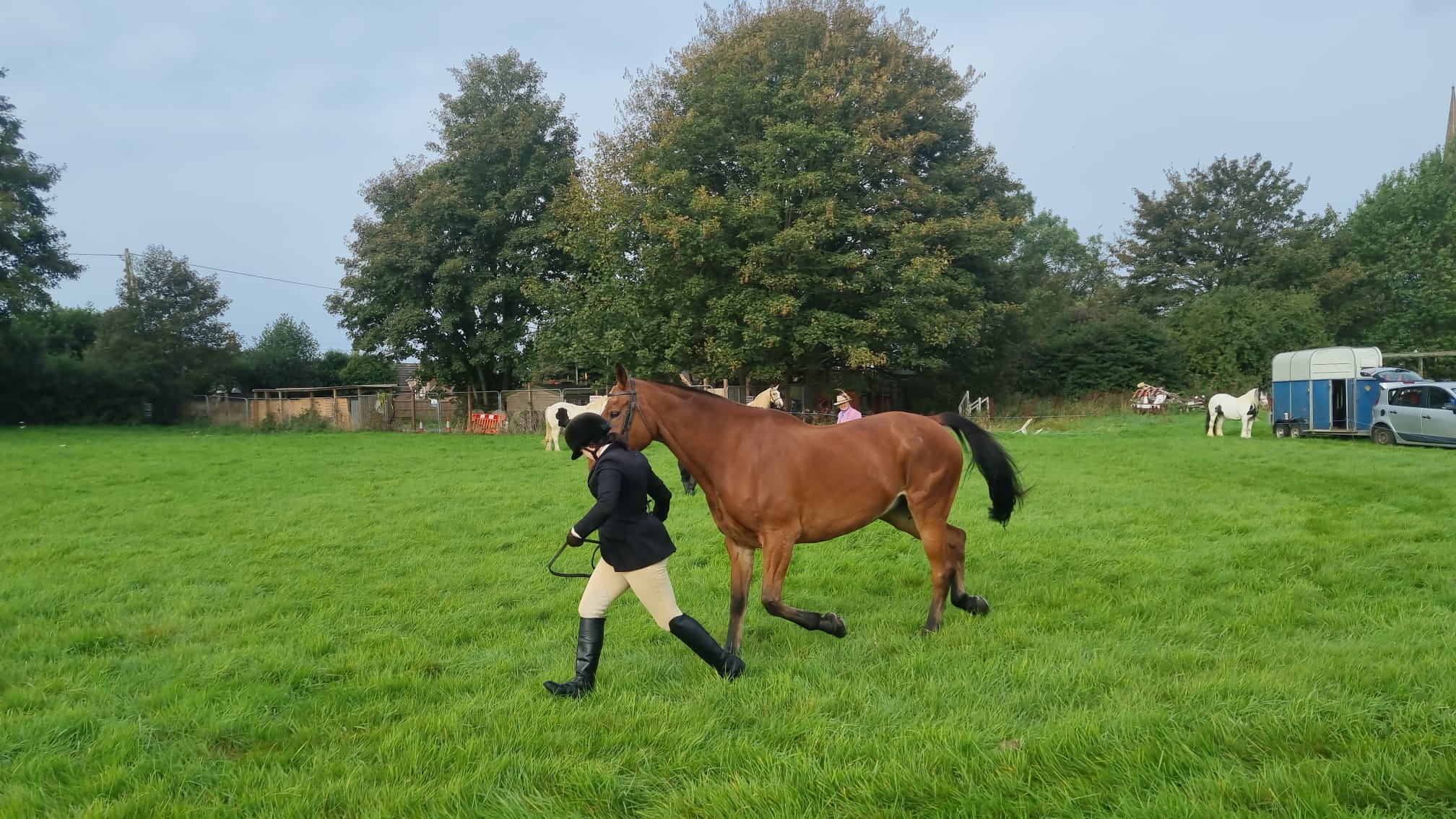 Woman running with horse